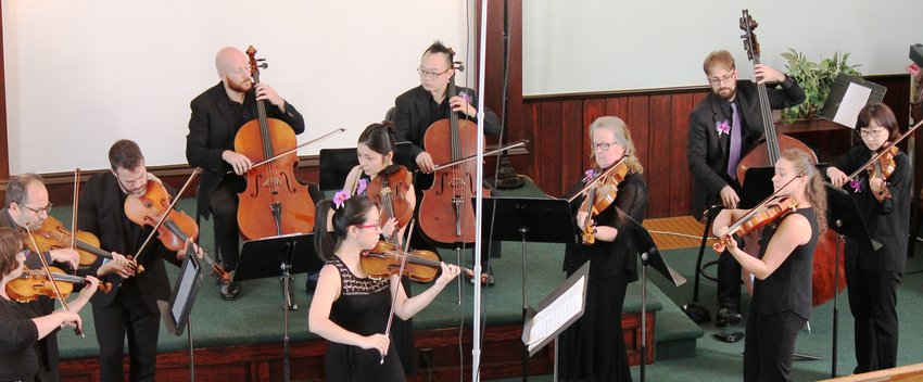 The Sullivan County Chamber Orchestra performs at the White Lake Reformed Presbyterian Church in 2019.....